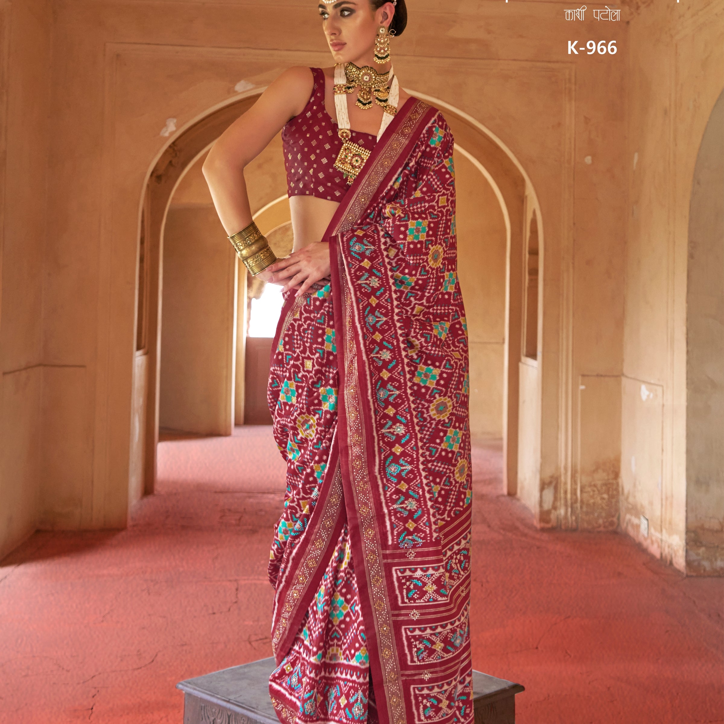 Deep Maroon & Wine Silk Saree with Traditional Ikat Weave and Golden Zari Detail