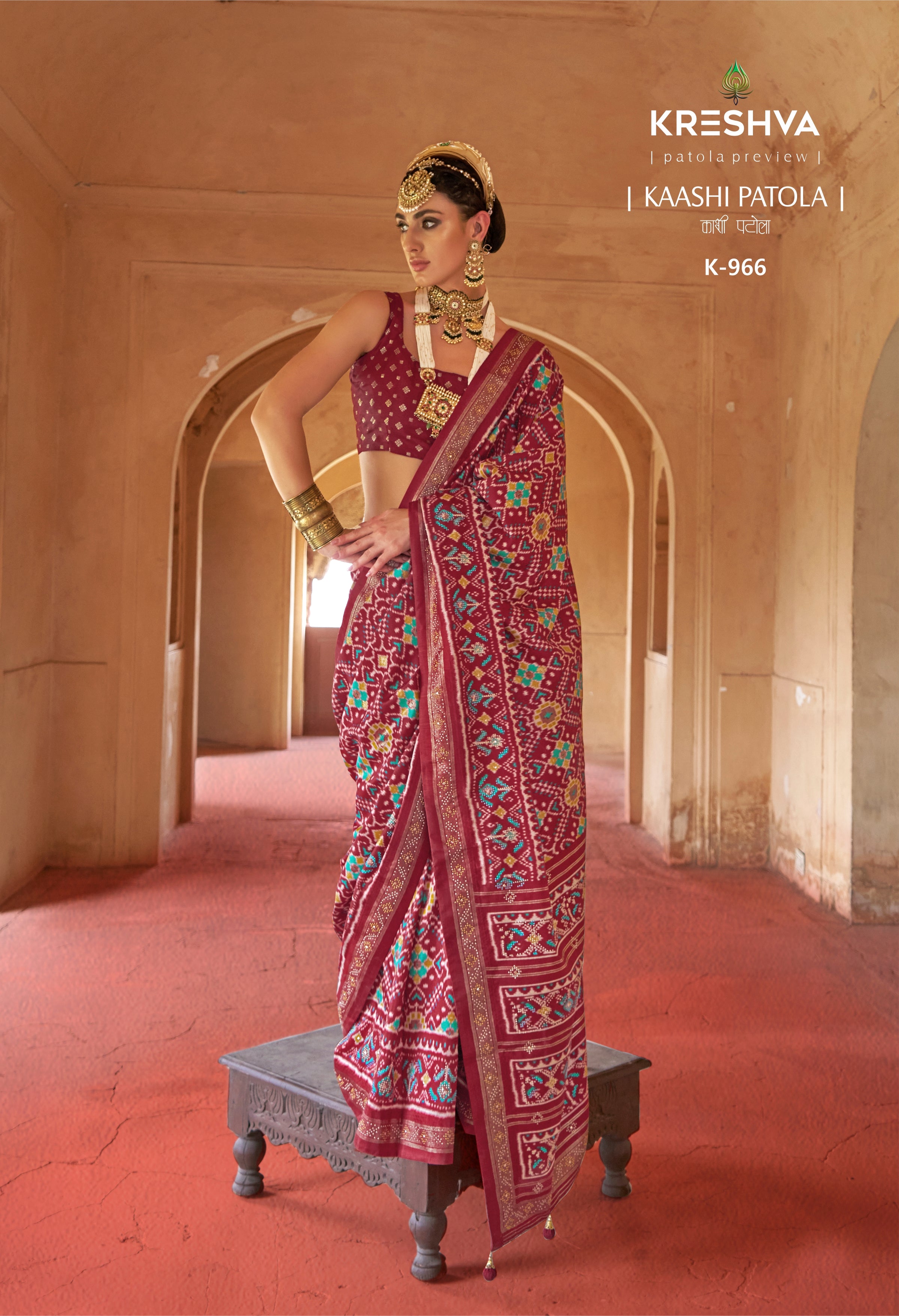 Deep Maroon & Wine Silk Saree with Traditional Ikat Weave and Golden Zari Detail