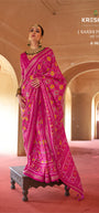 Rani Pink Silk Saree with Traditional Ikat Weave and Intricate Zari Border