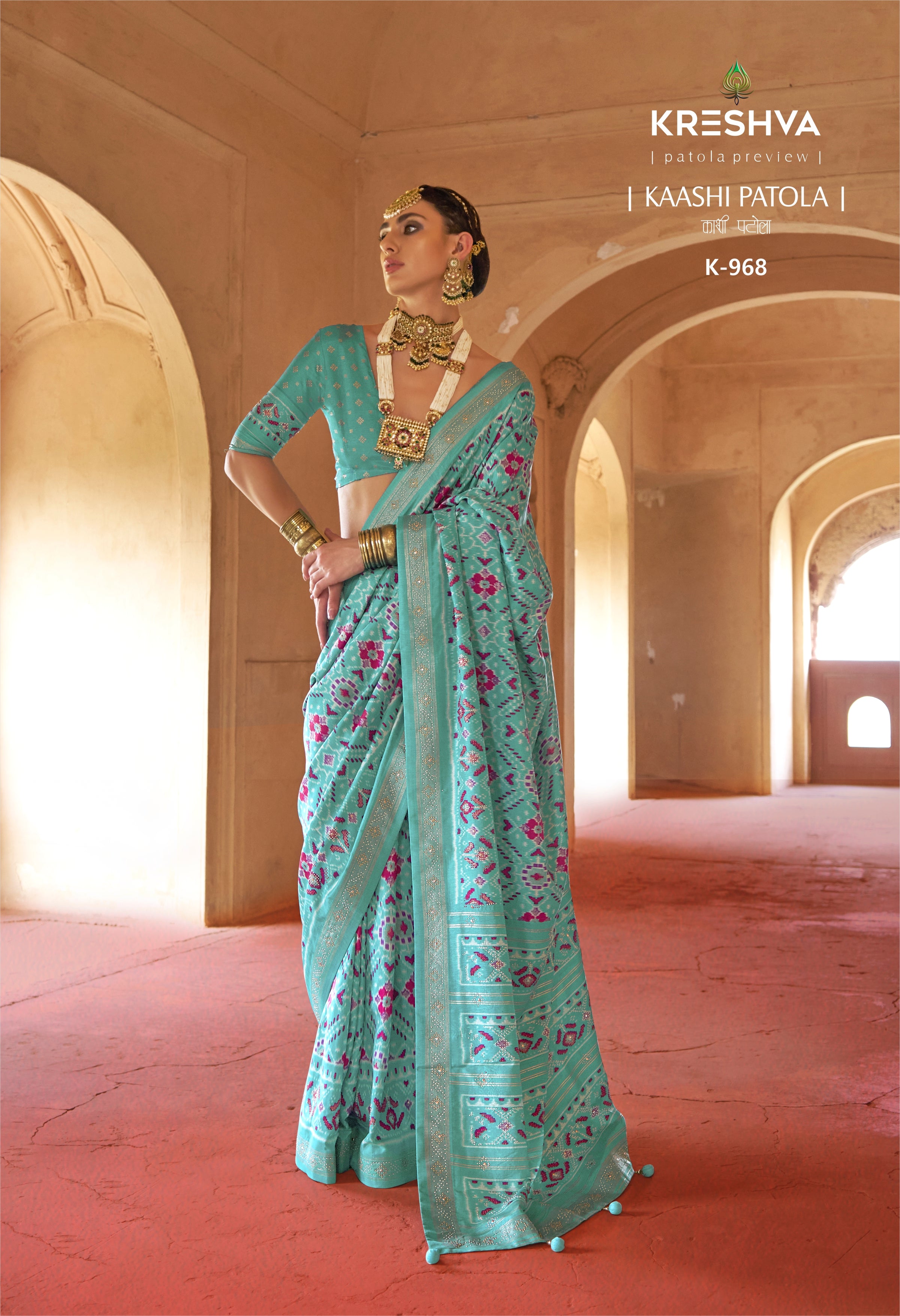 Firozi Teal Blue Silk Saree with Magenta Ikat Accents and Shimmering Gold Zari Border