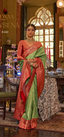 Rewaa Devsena R-682 Traditional Parrot Green Banarasi Silk Saree with Rich Red Zari Border