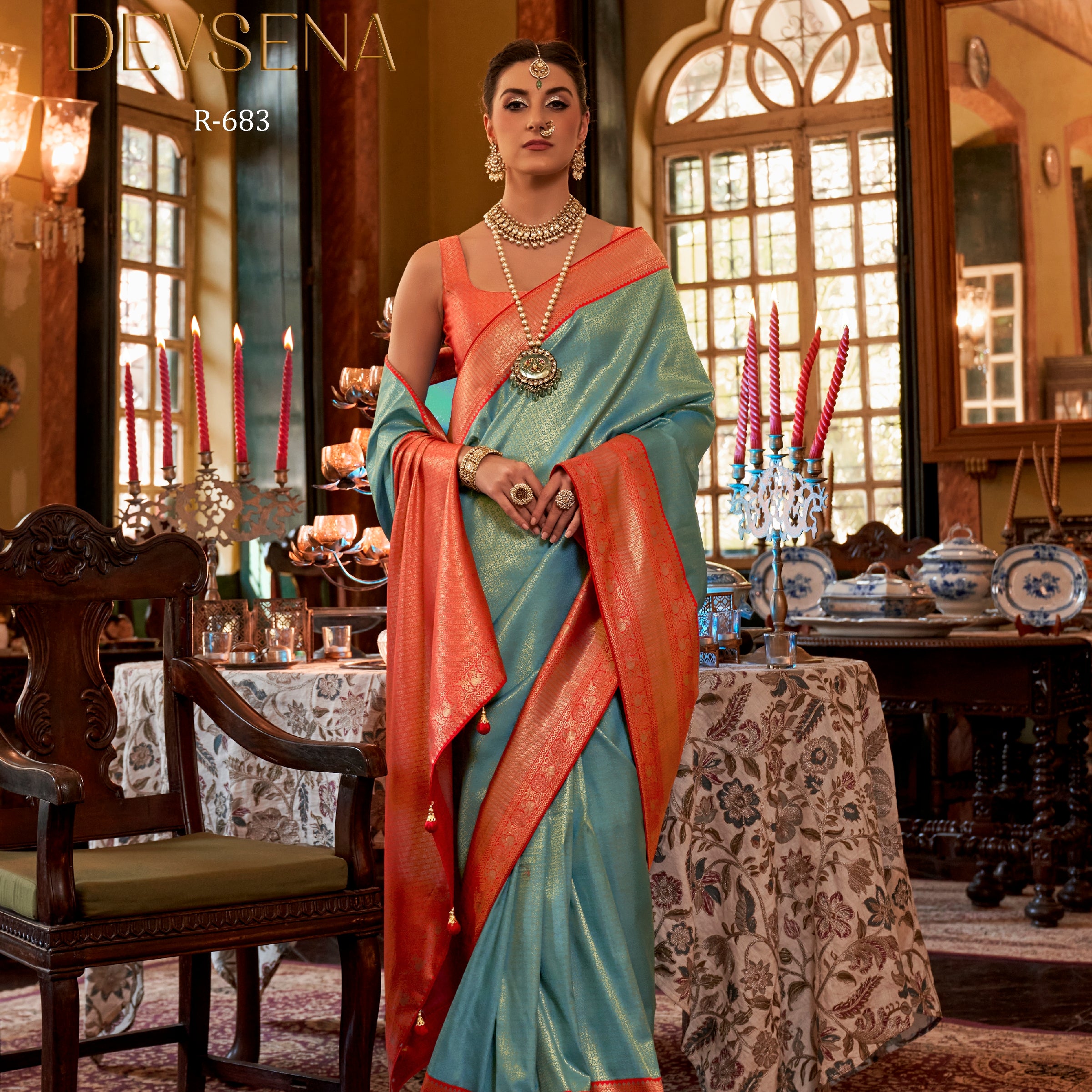 Rewaa Devsena R-683 Regal Seafoam Blue Banarasi Silk Saree with Vibrant Orange Zari Border