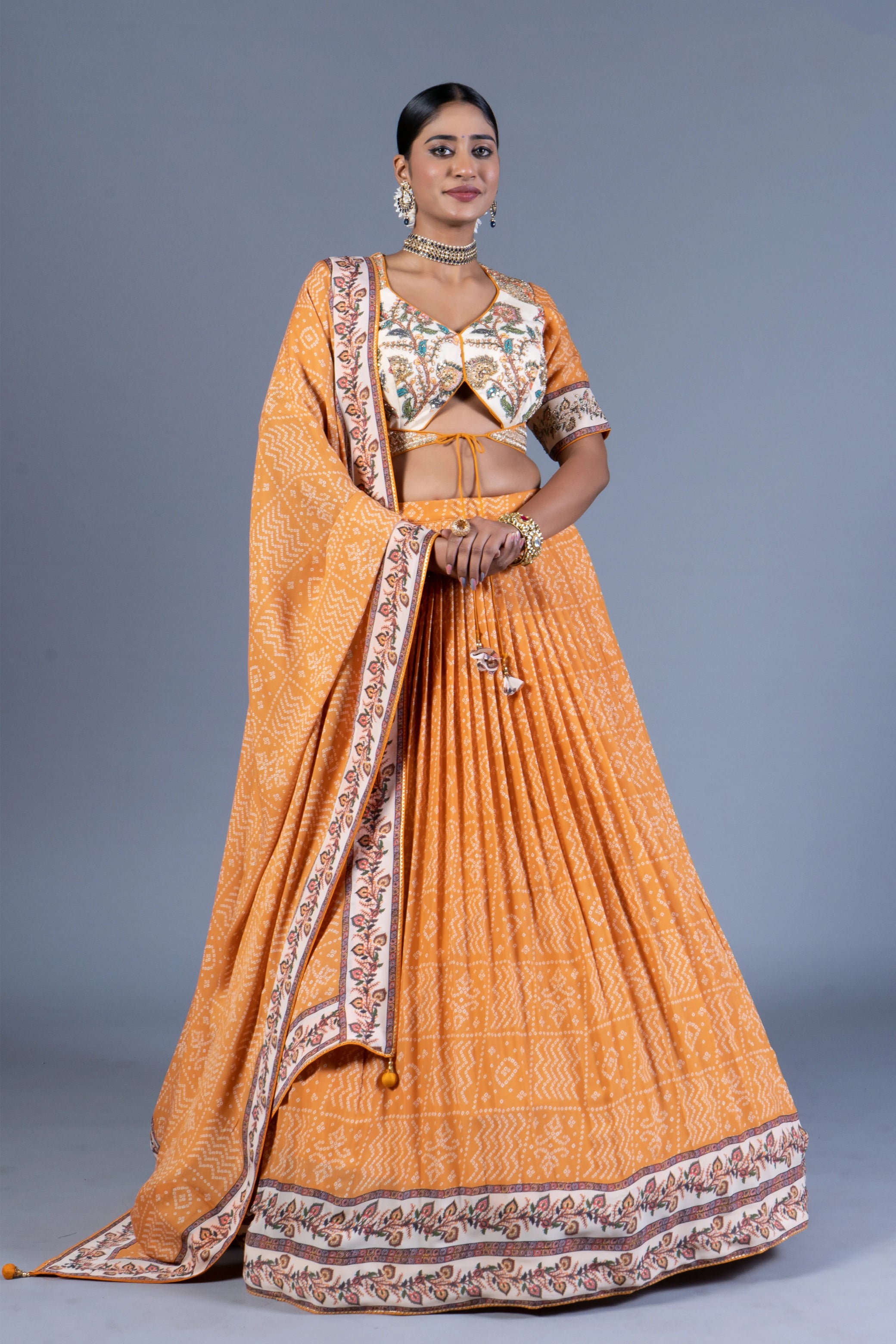 Mustard Yellow Bandhani Print Pleated Lehenga Choli with Embroidered Blouse and Dupatta
