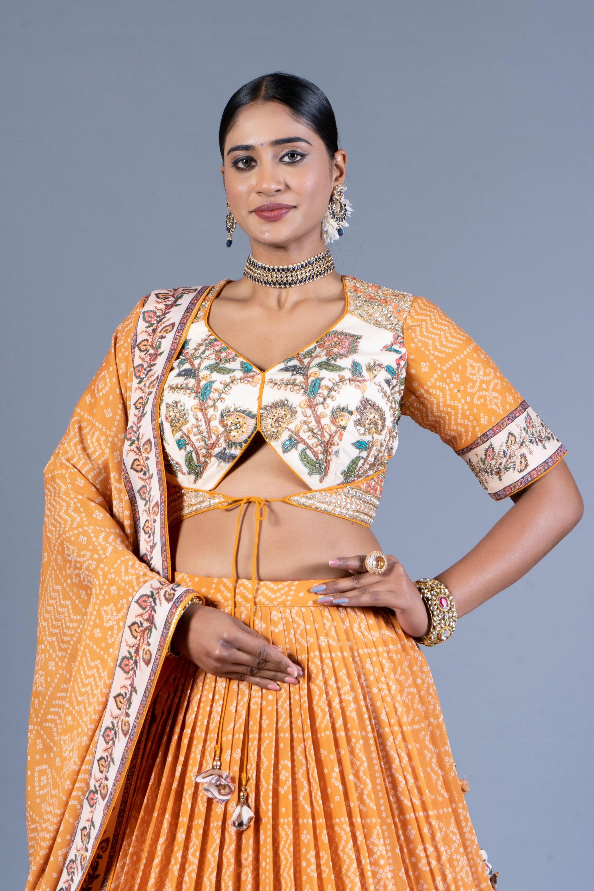 Mustard Yellow Bandhani Print Pleated Lehenga Choli with Embroidered Blouse and Dupatta