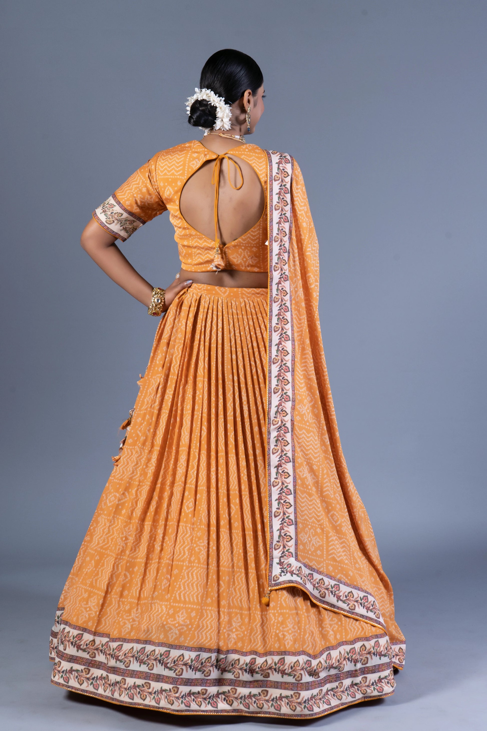 Mustard Yellow Bandhani Print Pleated Lehenga Choli with Embroidered Blouse and Dupatta