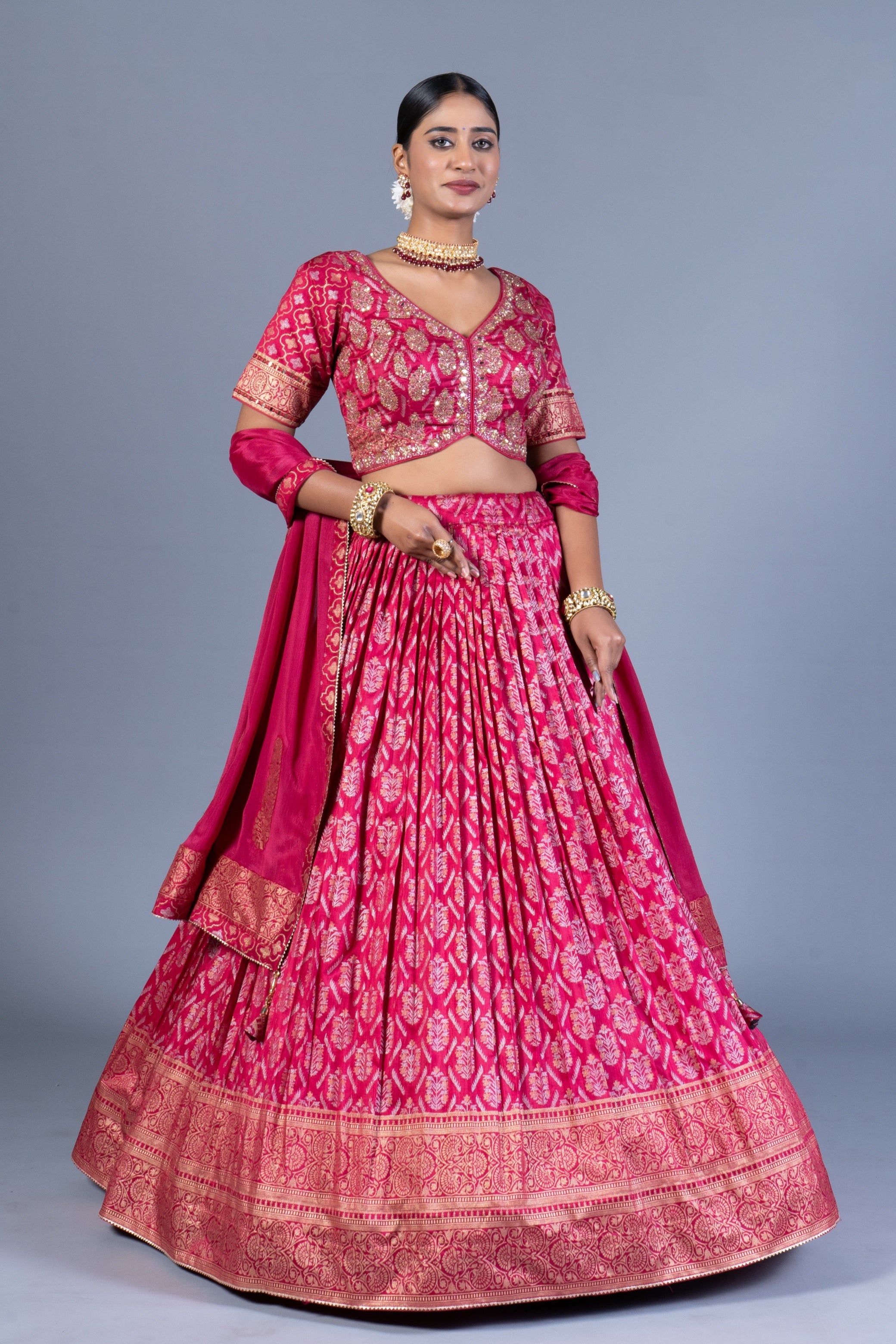 Rani Pink Patola Print Pleated Lehenga Choli with Embroidered Silk Blouse and Zari Border