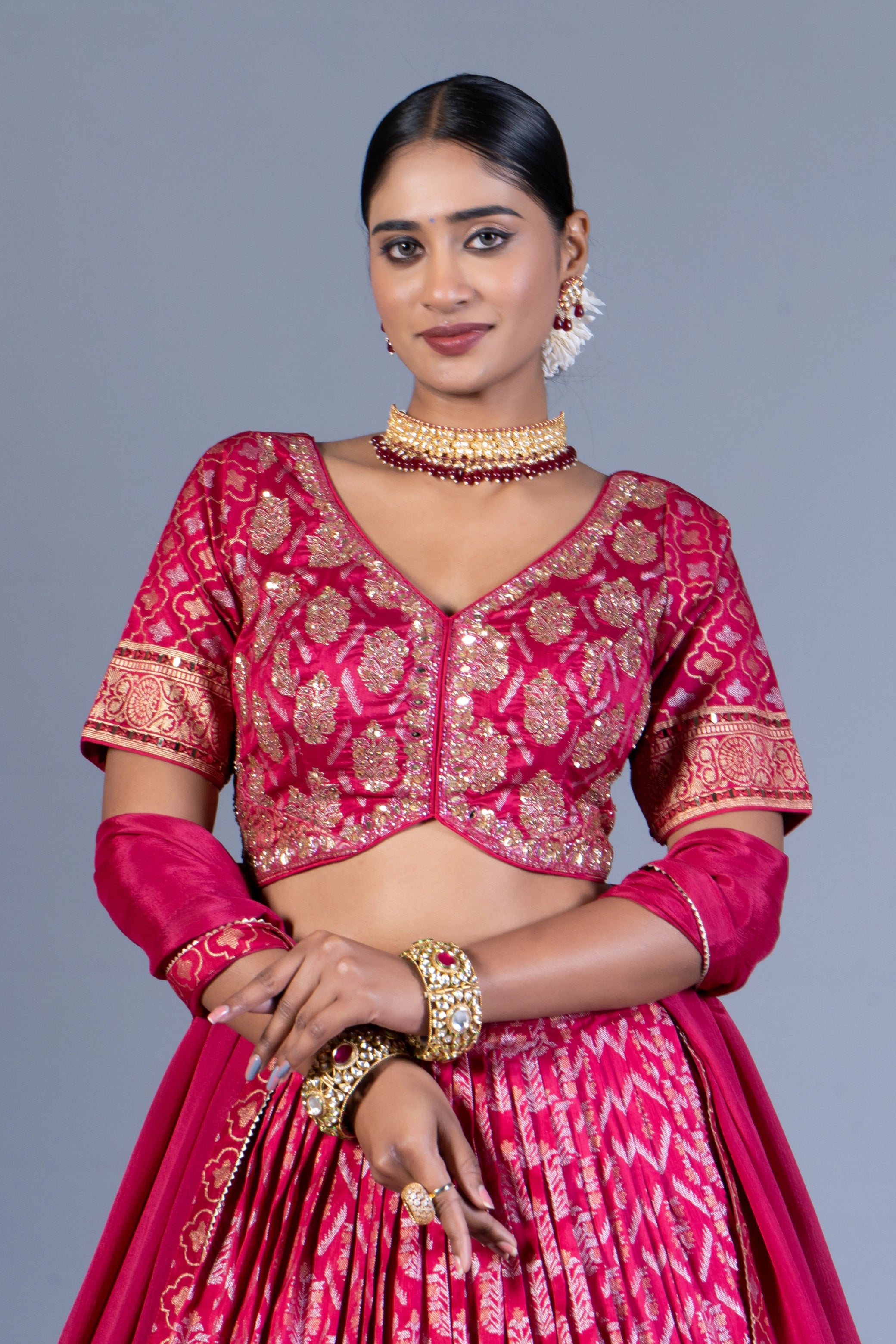 Rani Pink Patola Print Pleated Lehenga Choli with Embroidered Silk Blouse and Zari Border