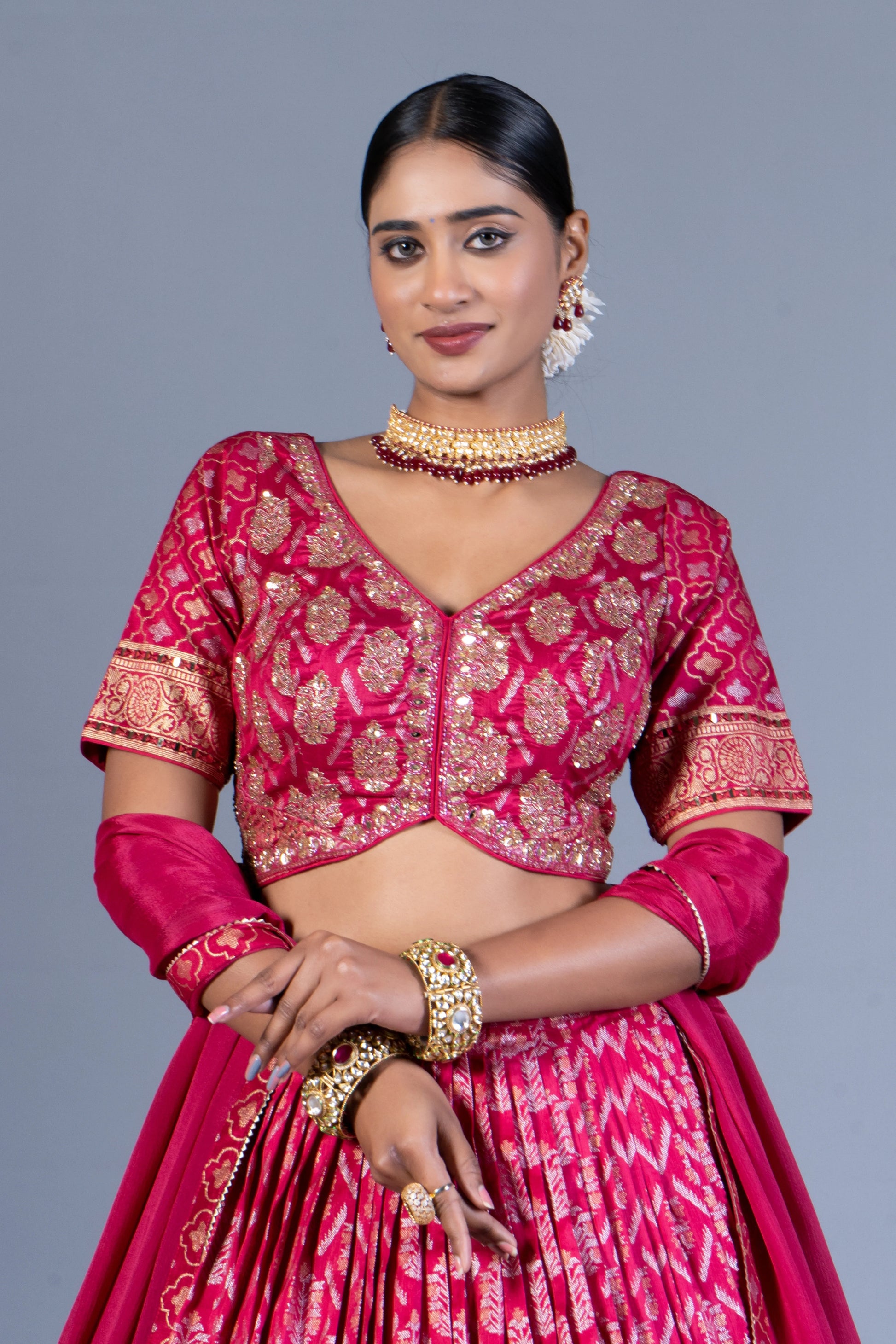 Rani Pink Patola Print Pleated Lehenga Choli with Embroidered Silk Blouse and Zari Border