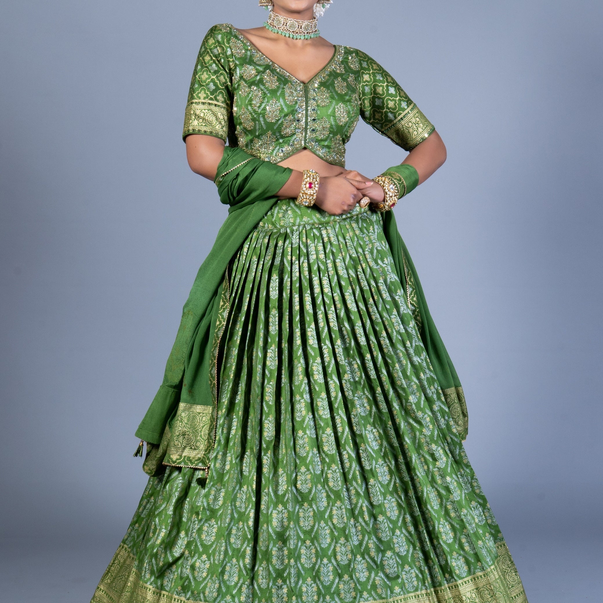Olive Green Patola Print Pleated Lehenga Choli with Embroidered Silk Blouse and Zari Border