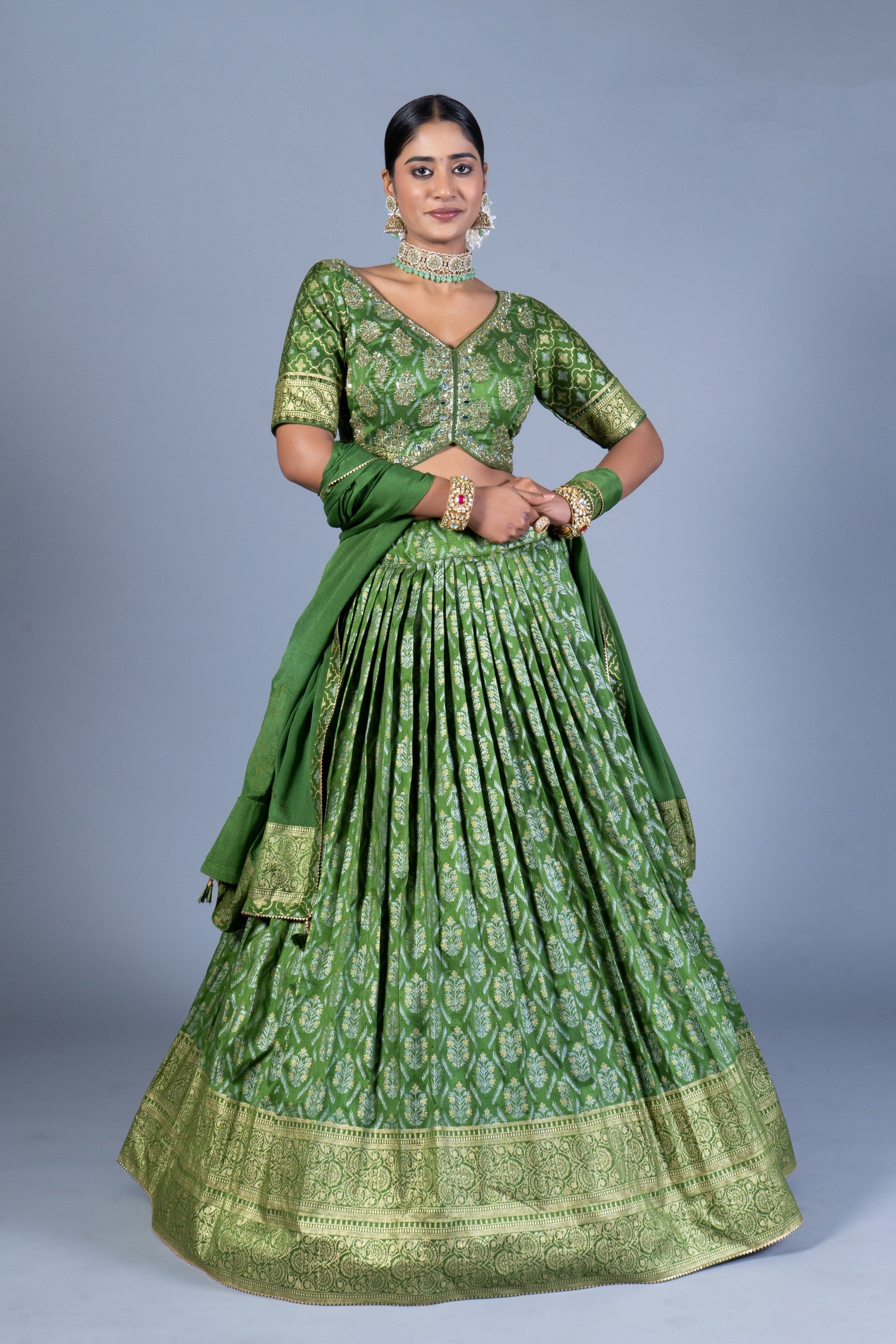 Olive Green Patola Print Pleated Lehenga Choli with Embroidered Silk Blouse and Zari Border