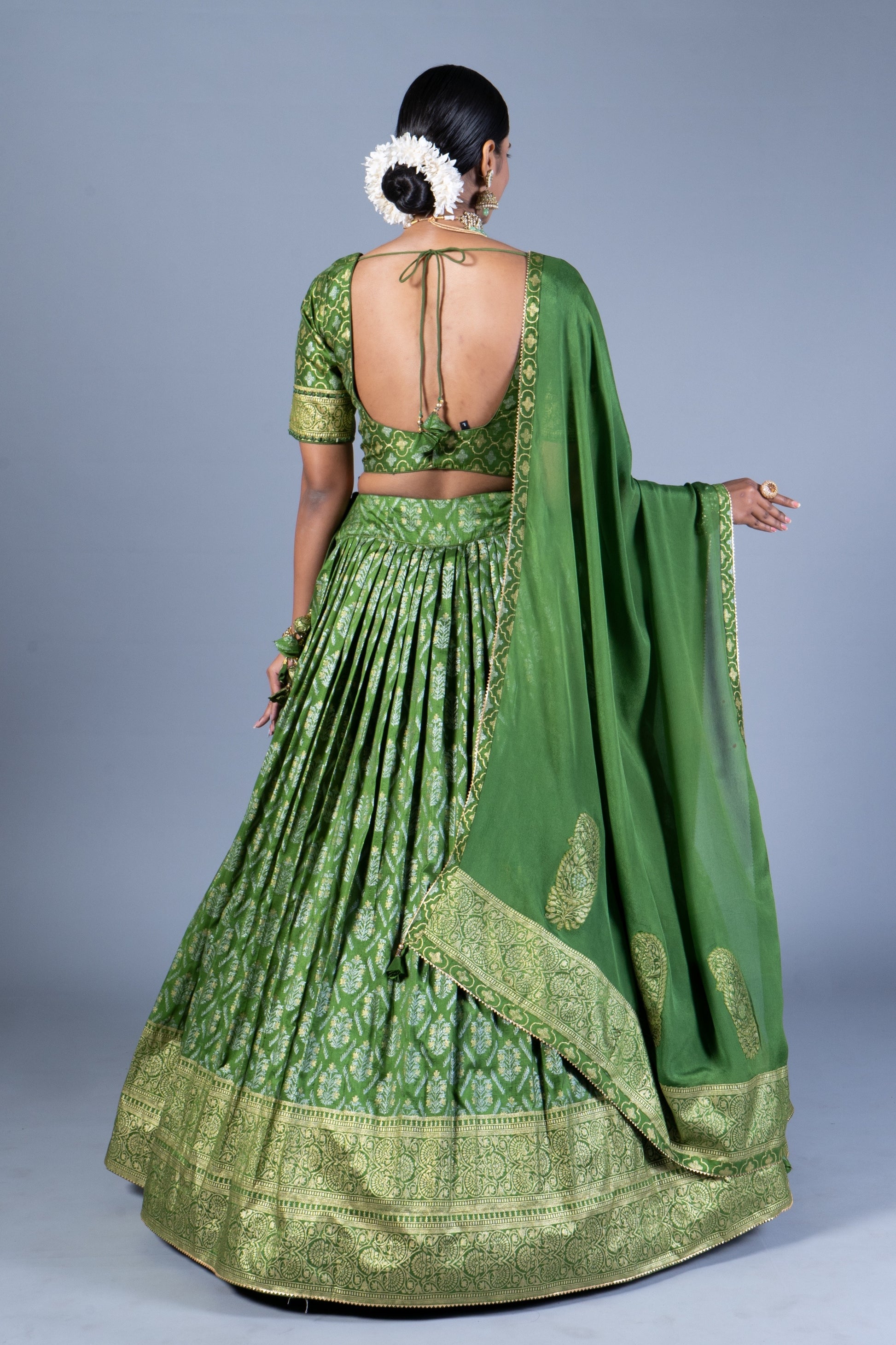 Olive Green Patola Print Pleated Lehenga Choli with Embroidered Silk Blouse and Zari Border