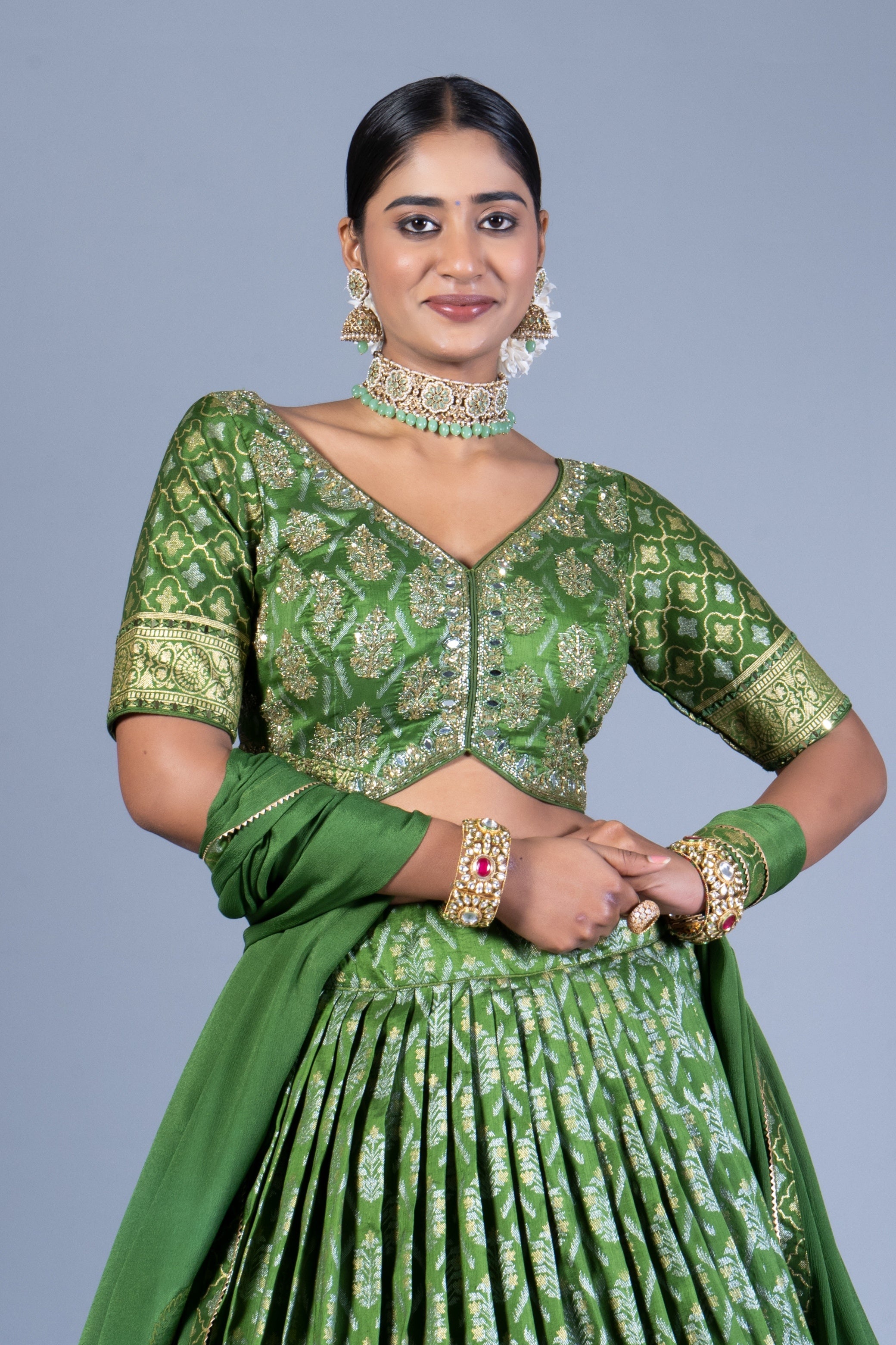 Olive Green Patola Print Pleated Lehenga Choli with Embroidered Silk Blouse and Zari Border