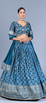 Teal Blue Patola Print Pleated Lehenga Choli with Embroidered Silk Blouse and Zari Border