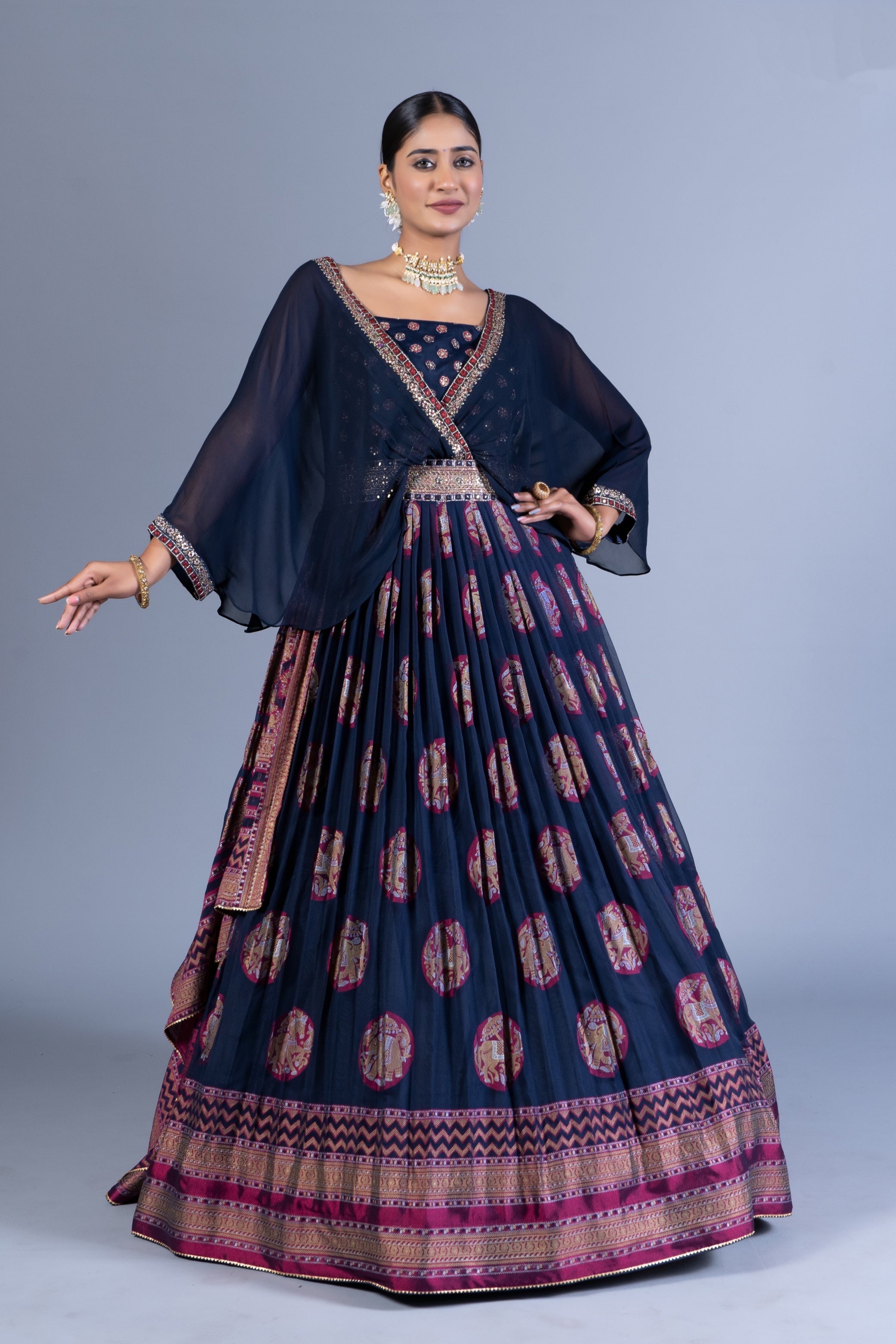 Regal Navy Blue Weaving Silk Gown with Chiffon Cape Overlay and Elephant Motif Butta