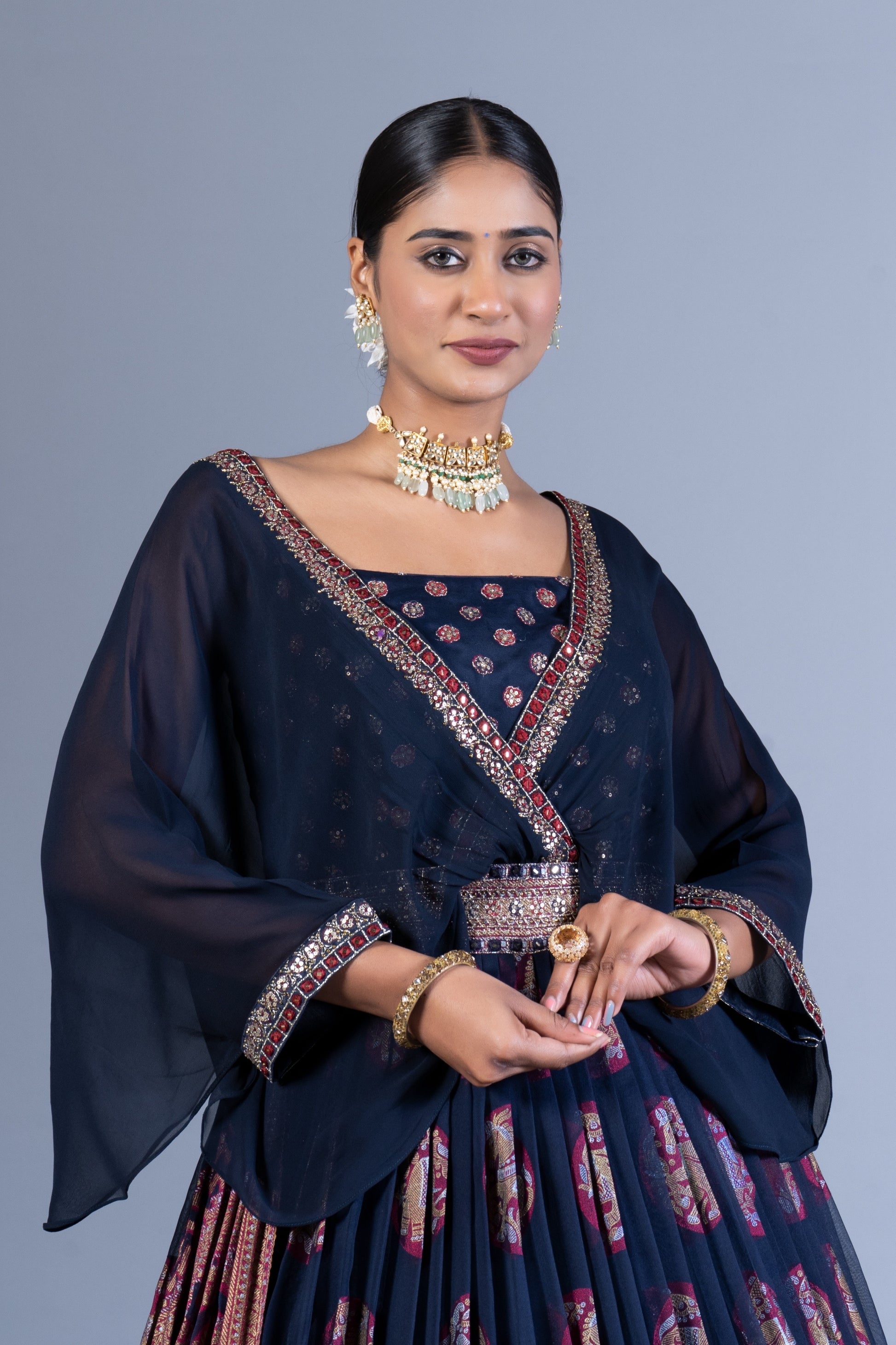 Regal Navy Blue Weaving Silk Gown with Chiffon Cape Overlay and Elephant Motif Butta