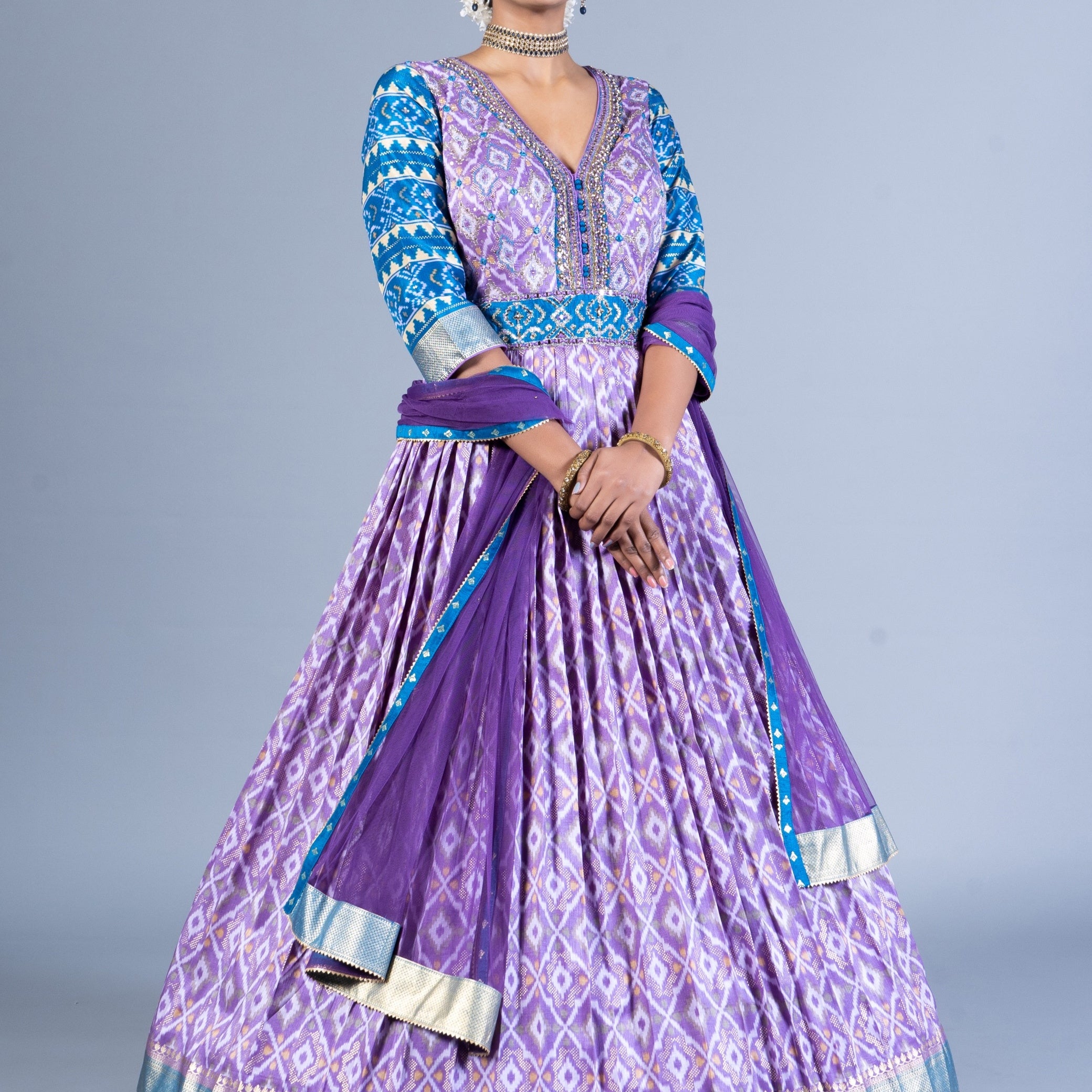 Exquisite Lavender & Teal Patola Silk Fusion Gown with Sequined V-Neck and Net Dupatta