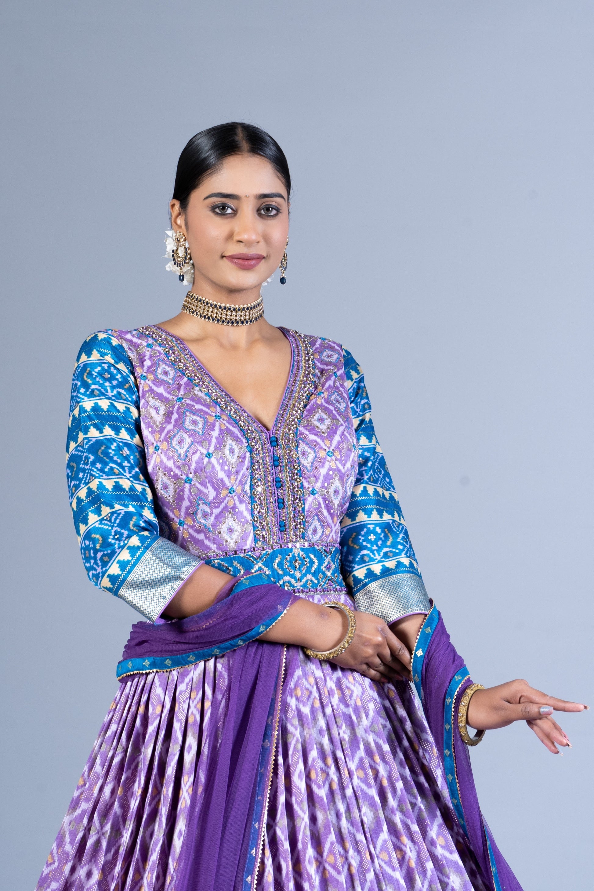 Exquisite Lavender & Teal Patola Silk Fusion Gown with Sequined V-Neck and Net Dupatta