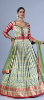 Royal Sage Green & Crimson Patola Silk Fusion Gown with Zari Border and Keyhole Back