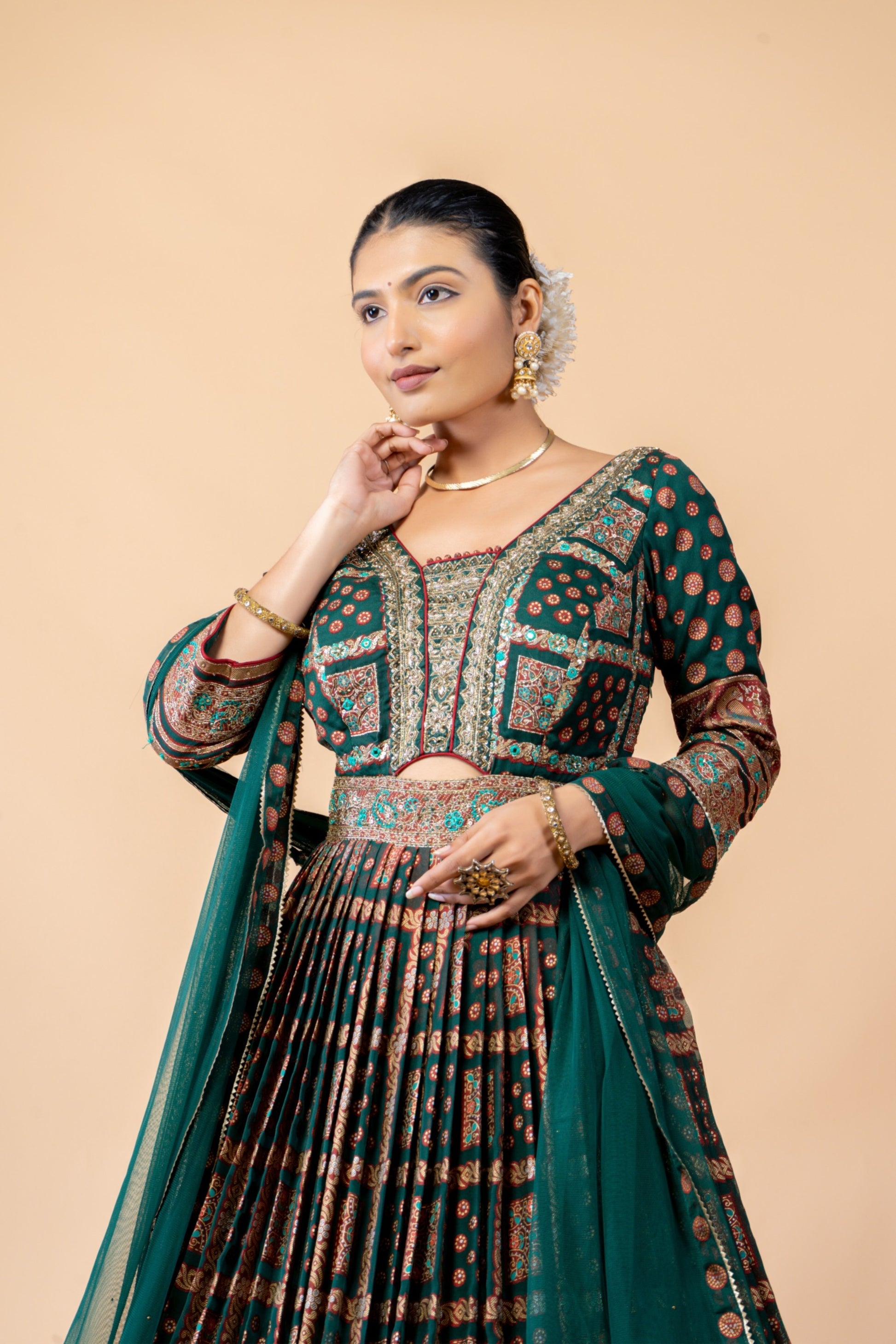 Royal Emerald Green Weaving Silk Gown with Shikargah Motifs and Embroidered Waistband