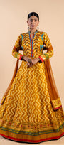 Radiant Mustard Yellow Ajrakh Fusion Gown with Leheriya Print and Open-Back Cutout
