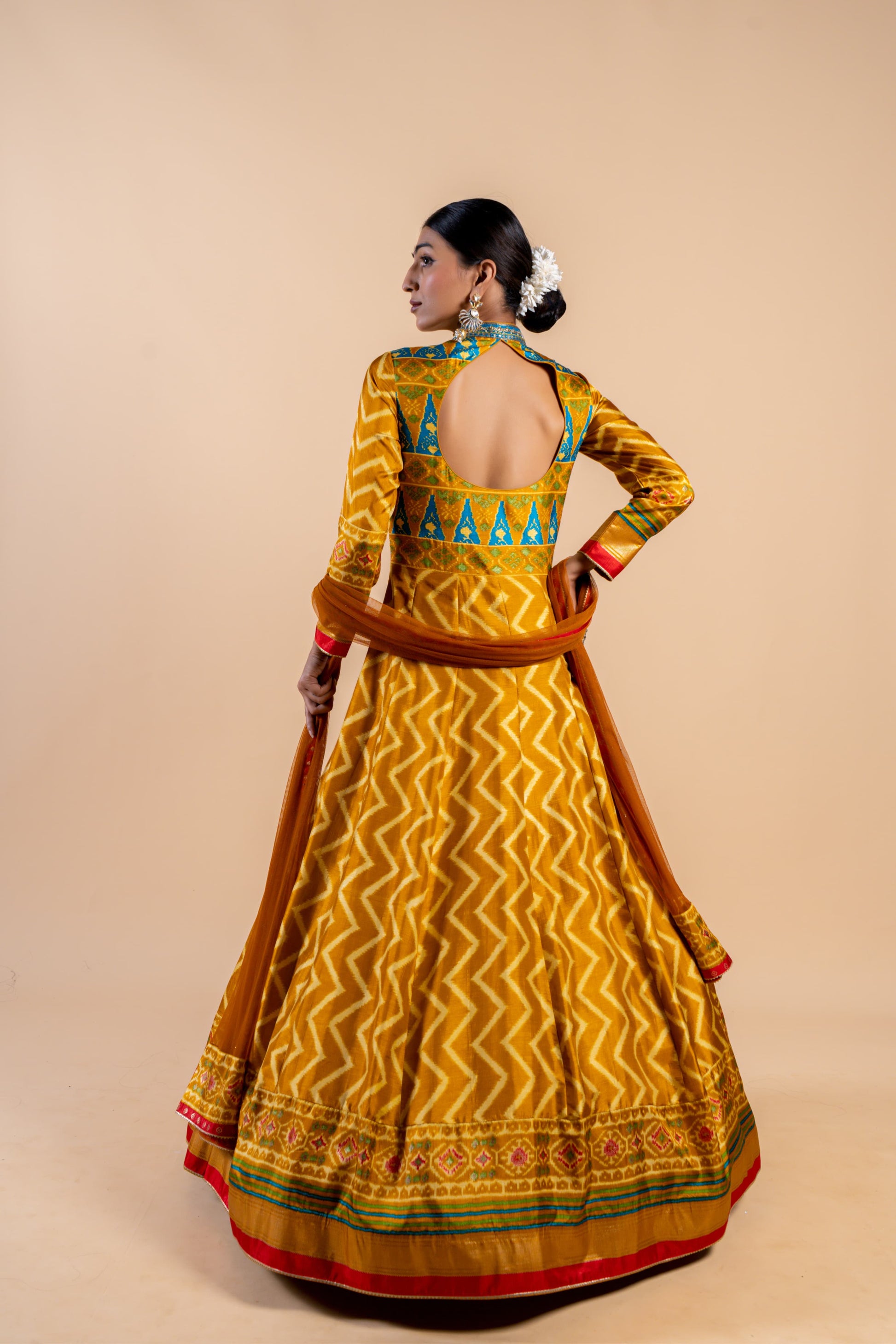 Radiant Mustard Yellow Ajrakh Fusion Gown with Leheriya Print and Open-Back Cutout