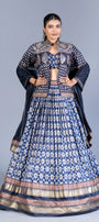 Indigo Blue Ajrakh Print Pleated Lehenga Set with Embroidered Crop Top and Long Jacket