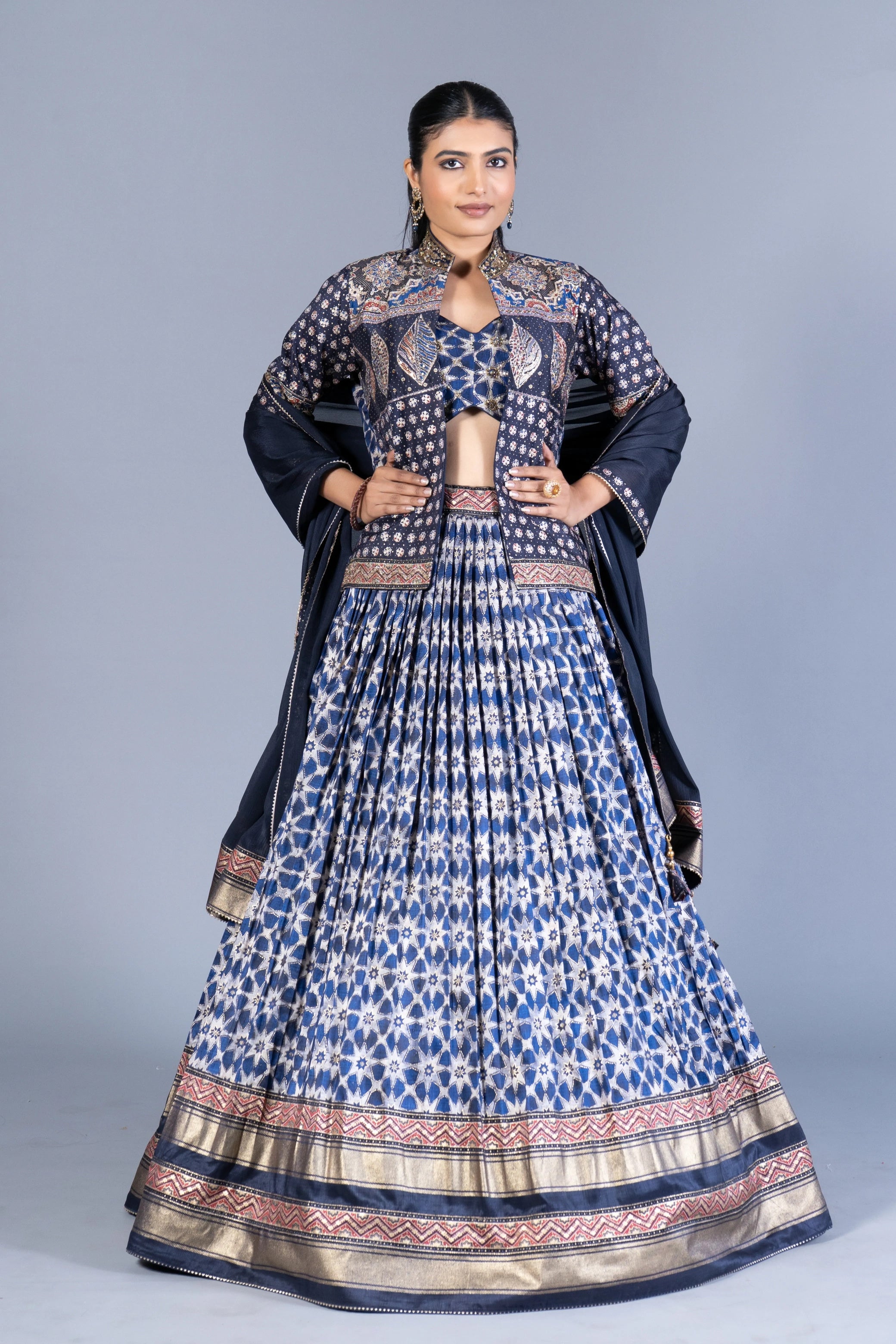 Indigo Blue Ajrakh Print Pleated Lehenga Set with Embroidered Crop Top and Long Jacket