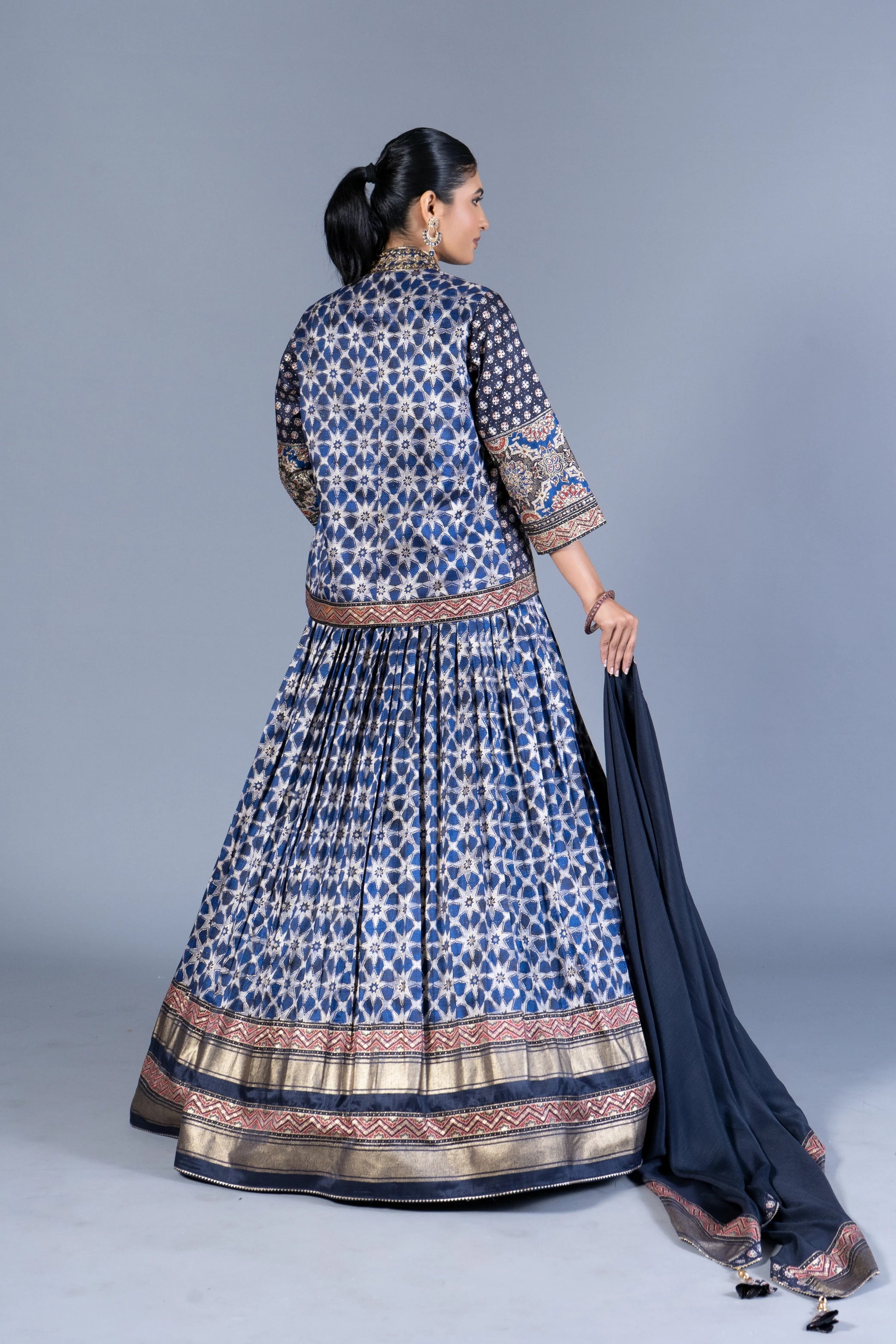 Indigo Blue Ajrakh Print Pleated Lehenga Set with Embroidered Crop Top and Long Jacket